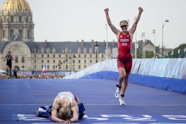 Julie Derron, of Switzerland celebrates winning the silver medal at the end of the women's individual triathlon competition at the 2024 Summer Olympics, Wednesday, July 31, 2024, in Paris, France. (Photo by David Goldman/AP Photo)