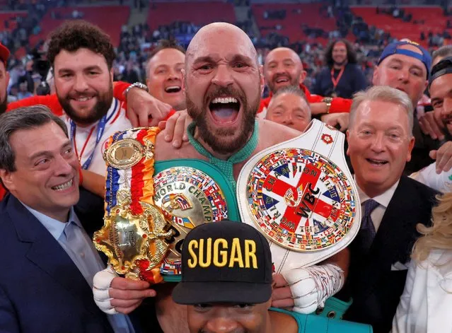 Tyson Fury celebrates victory after the WBC World Heavyweight Title Fight between Tyson Fury and Dillian Whyte at Wembley Stadium on April 23, 2022 in London, England. (Photo by Andrew Couldridge/Action Images via Reuters)