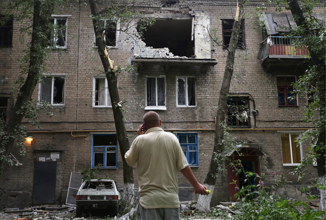 A residential building damaged by shells in Donetsk, Ukraine on June 9, 2016. (Photo by Mikhail Sokolov/TASS)