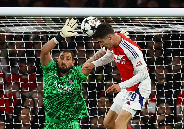 Kai Havertz of Arsenal scores his team's first goal against Gianluigi Donnarumma of Paris Saint-Germain (obscured) during the UEFA Champions League 2024/25 League Phase MD2 match between Arsenal FC and Paris Saint-Germain at Emirates Stadium on October 01, 2024 in London, England. (Photo by Matthew Childs/Action Images via Reuters)