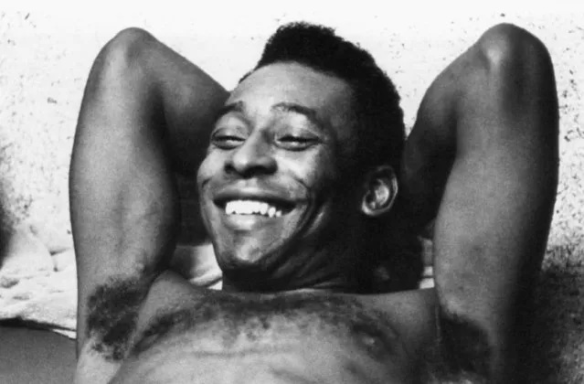 Pele, the world's most famous soccer player, relaxes after a workout on June 3, 1975 in Santos. The “Black Pearl” is expected to sign a three-year playing contract with the New York Cosmos that will net the Brazilian star almost $5 million after taxes. (Photo by AP Photo)