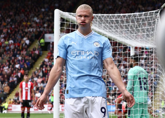 Manchester City's Norwegian striker #09 Erling Haaland celebrates scoring the opening goal during the English Premier League football match between Sheffield United and Manchester City at Bramall Lane in Sheffield, northern England on August 27, 2023. (Photo by Darren Staples/AFP Photo)