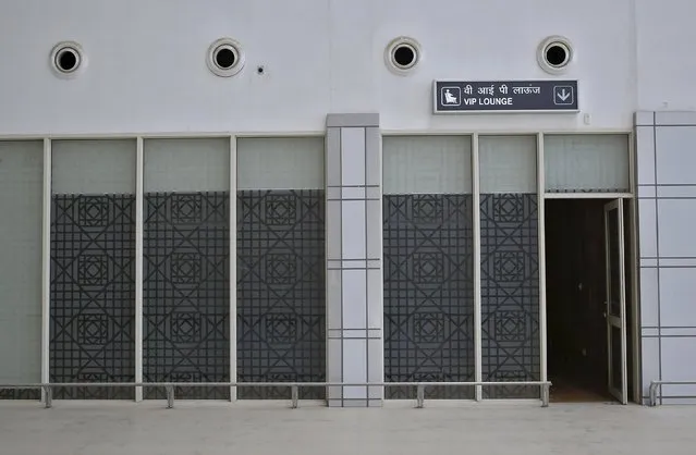 Signage is displayed inside the Jaisalmer Airport in desert state of Rajasthan, India, August 13, 2015. (Photo by Anindito Mukherjee/Reuters)