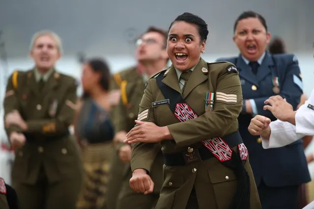 New Zealand Defence Force personal perform a haka during Te Rau Aroha, an evening to commemorate Maori service in the New Zealand Armed Forces on February 05, 2020 in Waitangi, New Zealand. The Waitangi Day national holiday celebrates the signing of the treaty of Waitangi on February 6, 1840 by Maori chiefs and the British Crown, that granted the Maori people the rights of British Citizens and ownership of their lands and other properties. (Photo by Fiona Goodall/Getty Images)