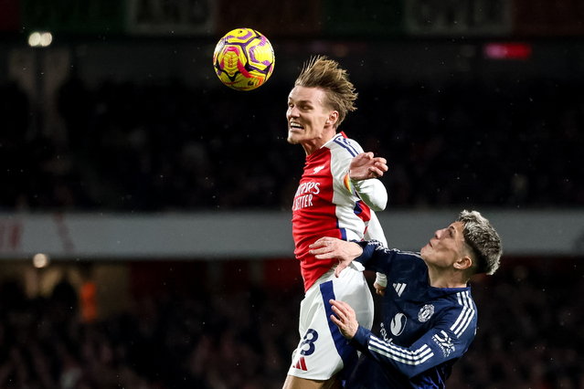 Alejandro Garnacho of Manchester United (R) and Martin Odegaard of Arsenal (L) in action during the English Premier League soccer match between Arsenal FC and Manchester United, in London, Britain, 04 December 2024. (Photo by Neil Hall/EPA)