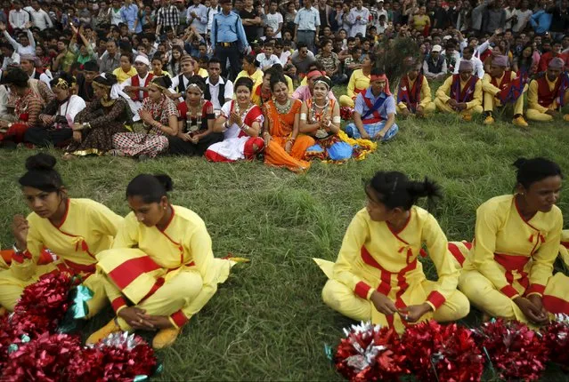 Performers dressed in traditional attire gather during a celebration a day after the first democratic constitution was announced in Kathmandu, Nepal September 21, 2015. (Photo by Navesh Chitrakar/Reuters)