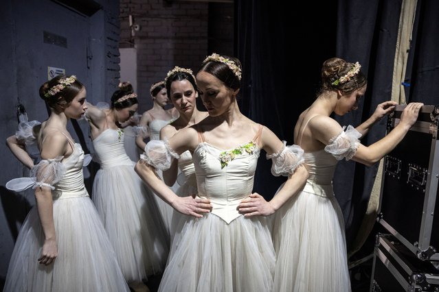 Ballerinas prepare for practising the revival of the classical ballet “Chopiniana”, the first since Russia's full-scale invasion of Ukraine in 2022, in the underground area of the National Academic Opera and Ballet Theatre amid ongoing attacks, in Kharkiv, Ukraine, on April 27, 2025. (Photo by Marko Djurica/Reuters)