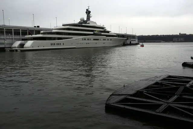 The Eclipse, reported to be the largest private yacht in the world, is viewed docked at a pier in New York on February 19, 2013 in New York City. The boat, which measures 557ft in length and is estimated to cost 1.5 billion US dollars, is owned by Russian billionaire Roman Abramovich and arrived into New York on Wednesday.  (Photo by Spencer Platt)