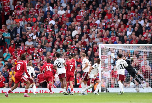 Dominik Szoboszlai of Liverpool scores his team's first goal in a free kick during the Premier League match between Liverpool and Arsenal at Anfield on August 31, 2025 in Liverpool, England. (Photo by Alex Pantling/Getty Images)