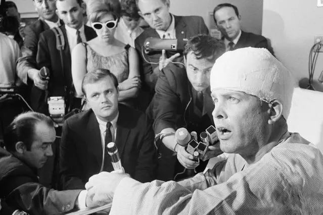 Paul Schrade, 43, hit by one of the bullets fired by Sen. Robert Kennedy's assailant, holds a press conference in his room at Kaiser Hospital in Los Angeles June 10, 1968. Schrade, a Los Angeles representative of the United Auto Workers, sustained a fractured skull but is recovering and is in good Condition. (Photo by AP Photo)