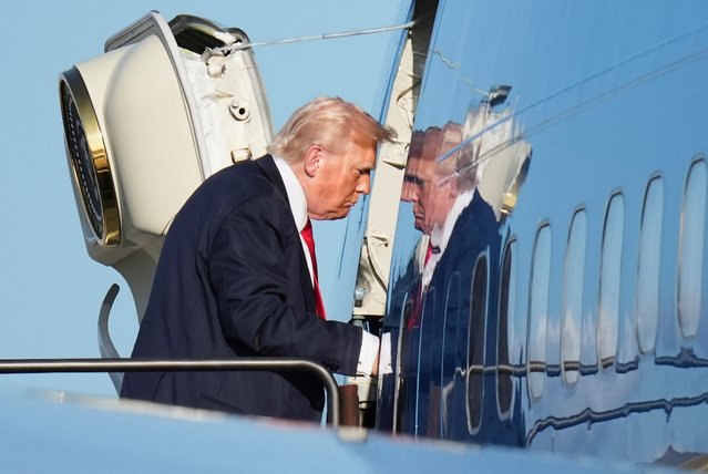 President Donald Trump boards Air Force One, Sunday, July 13, 2025, in Newark, N.J., en route to Washington. (Photo by Jacquelyn Martin/AP Photo)
