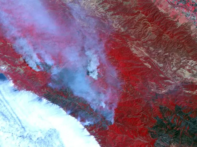 This false-color image of the Santa Lucia Range Mountains near Big Sur, California, was captured by Advanced Spaceborne Thermal Emission and Reflection Radiometer (ASTER) on NASA's Terra satellite in this June 29, 2008 file photo. The universe in false colour imagery. (Photo by Reuters/NASA/GSFC/METI/ERSDAC/JAROS and U.S./Japan ASTER Science Team)