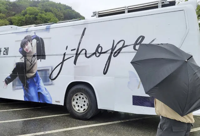 A picture of J-Hope, a member of South Korean K-pop band BTS, is seen on a bus, prepared by his fans, near a military boot camp in Wonju, South Korea, Tuesday, April 18, 2023. J-Hope entered a South Korean boot camp Tuesday, April 18, 2023 to start his 18-month compulsory military service, becoming the group’s second member to join the country's army. (Photo by Yang Ji-woong/Yonhap via AP Photo)