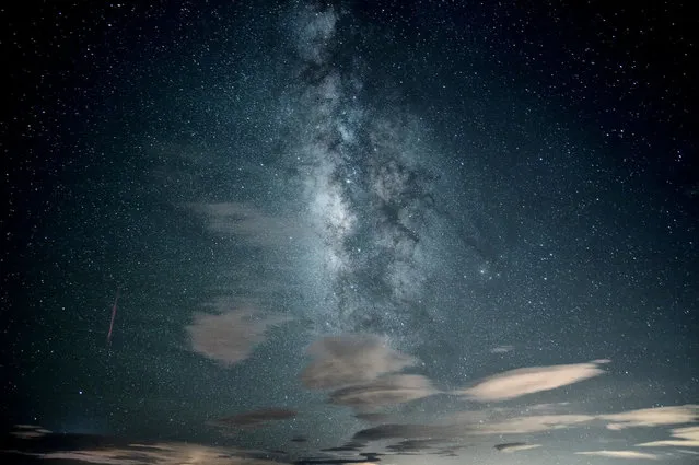 Photographer Thunderbolt_TW took this photo of a Perseid meteor (in purple on the left) and the Milky Way on August 14, 2012. (Photo by Thunderbolt_TW)