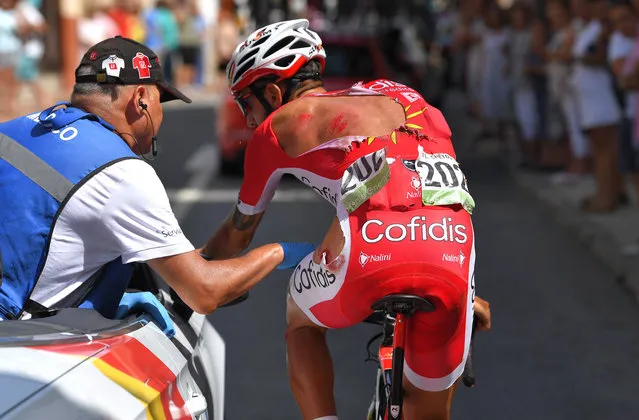 French cyclist Loic Chetout of Team Cofidis receives treatment for injuries caused by a fall during the 208km Talavera de la Reina to Alto de la Covatilla stage nine of La Vuelta, Spain on September 2, 2018. (Photo by Tim de Waele/Getty Images)