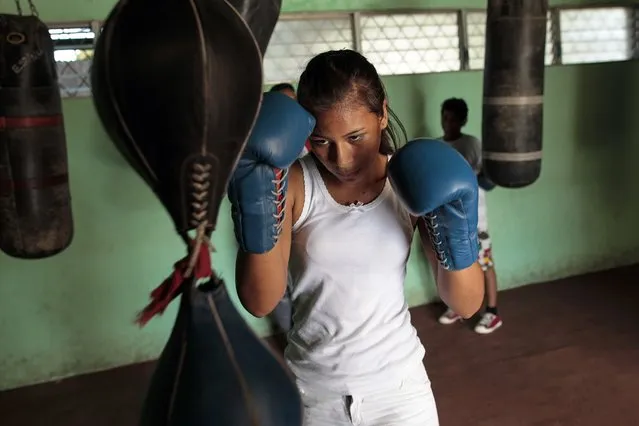 Idania Sandoval, 14, trains at the National Institute of Sport in Managua March 4, 2015. A study done by the Psychology alumni of the National Autonomous University of Nicaragua (UNAN-Managua) revealed that about 1 million women in Nicaragua suffer from domestic violence. (Photo by Oswaldo Rivas/Reuters)