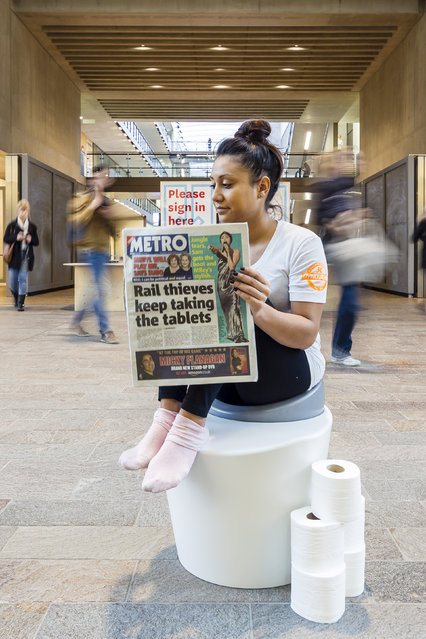 A model poses with “The Wellbeing Toilet” the winning entry from a Dyno-Rod Initiative to create a new design for the domestic toilet at Central Saint Martins on November 18, 2013 in London, England. The concept was commissioned to mark 50 years of Dyno-Rod and World Toilet Day on November 19th, 2013 The “Wellbeing Toilet” looks at the health and wellbeing aspect of getting rid of your bodily waste by being sculpted to enhance the position of your body by enabling you to squat rather than sit. (Photo by Miles Willis/Getty Images for Dyno-Rod)
