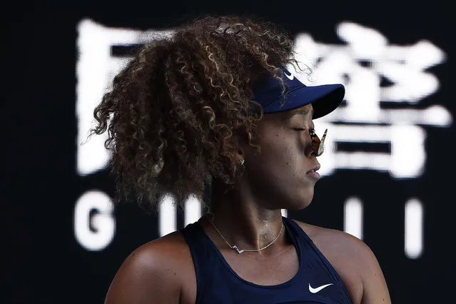 Naomi Osaka of Japan looks on as a butterfly lands on her face in her Women's Singles third round match against Ons Jabeur of Tunisia during day five of the 2021 Australian Open at Melbourne Park on February 12, 2021 in Melbourne, Australia. (Photo by Daniel Pockett/Getty Images)