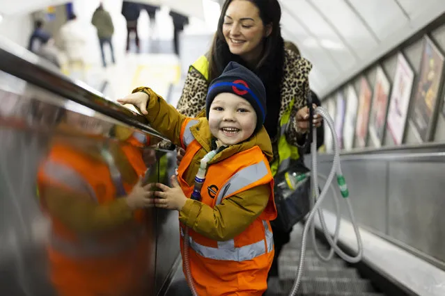 Mum Shevonne with Henry, 6, who has been under the care of Great Ormond Street Hospital (GOSH) all his life, is treated to a VIP experience on his first ever visit to a London Underground station, as he is featured on a GOSH Charity Christmas Appeal ad. Picture date: Sunday, December 17, 2023. (Photo by David Parry/PA Wire)