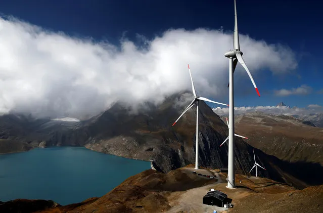 Wind turbines are pictured at Swisswinds farm, Europe's highest wind farm at 2500m, before the topping out ceremony near the Nufenen Path in Gries, Switzerland September 30, 2016. (Photo by Denis Balibouse/Reuters)