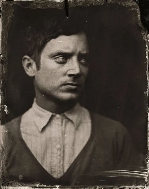 Elijah Wood poses for a tintype (wet collodion) portrait at The Collective and Gibson Lounge Powered by CEG, during the 2014 Sundance Film Festival in Park City, Utah. (Photo by Victoria Will/AP Photo/Invision)