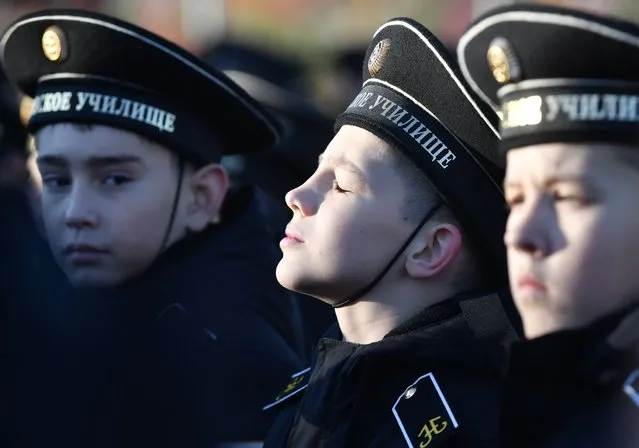 An initiation ceremony into cadets of the Murmansk branch of Nakhimov Naval School in Murmansk, Russia on October 2, 2021. (Photo by Lev Fedoseyev/TASS)