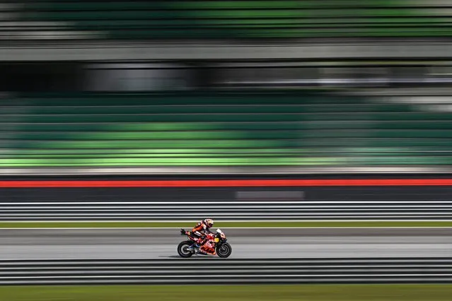 Red Bull KTM Factory Racing Jack Miller steers his bike during the second day of the pre-season MotoGP test at the Sepang International Circuit in Sepang on February 7, 2024. (Photo by Mohd Rasfan/AFP Photo)