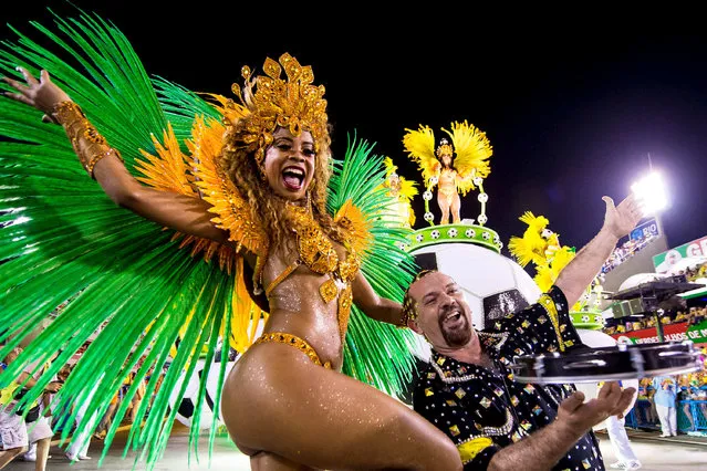 Members of Uniao da Ilha samba school perform during its parade at 2014 Brazilian Carnival at Sapucai Sambadrome on March 03, 2014 in Rio de Janeiro, Brazil. (Photo by Buda Mendes/Getty Images)