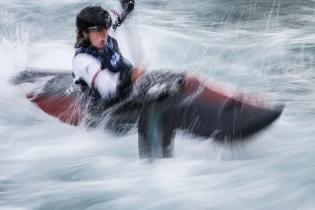 British Phoebe Spicer competes in the Women's kayak cross final race during the Slalom & Kayak Cross Selection Series, at Lee Valley White Water Centre, in Waltham Cross, north of London, on April 1, 2024. (Photo by Adrian Dennis/AFP Photo)