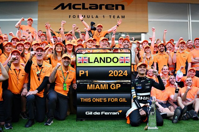 Race winner Lando Norris of Great Britain and McLaren celebrates victory with his team after the F1 Grand Prix of Miami at Miami International Autodrome on May 05, 2024 in Miami, Florida. (Photo by Clive Mason/Getty Images)