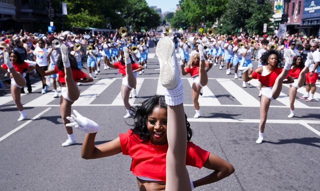 Members of the Eastern High School Dance Team take part in the annual LGBTQ+ Capital Pride parade in Washington on June 8, 2024. (Photo by Nathan Howard/Reuters)