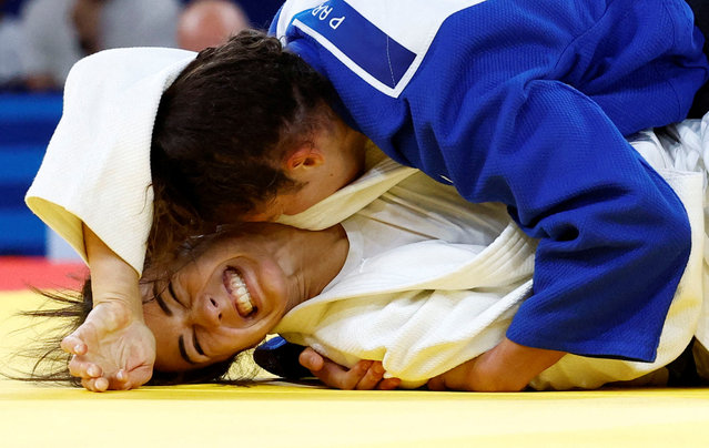 Gabriella Willems of Belgium, left, and Miriam Butkereit of Germany compete during the women-70 kg quarterfinal judo match at Champ-de-Mars Arena during the 2024 Summer Olympics in Paris, France on July 31, 2024. (Photo by Kim Kyung-Hoon/Reuters)