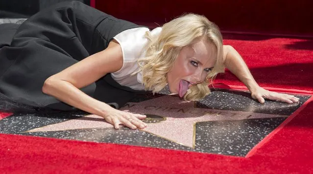Kristin Chenoweth poses for photographers at a ceremony where she received a star on the “Hollywood Walk of Fame” in Los Angeles July 24, 2015. (Photo by Phil McCarten/Reuters)