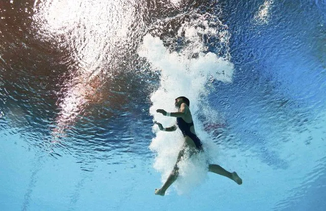 Kim Kuk Hyang of North Korea is seen underwater during the women's 10m platform preliminary event at the Aquatics World Championships in Kazan, Russia July 29, 2015. (Photo by Stefan Wermuth/Reuters)
