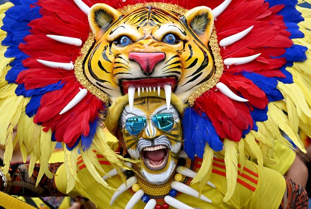 A Colombian fans cheers before the 2026 FIFA World Cup South American qualifiers football match between Colombia and Argentina, at the Metropolitano Roberto Meléndez stadium in Barranquilla, Colombia, on September 10, 2024. (Photo by Joaquín Sarmiento/AFP Photo)