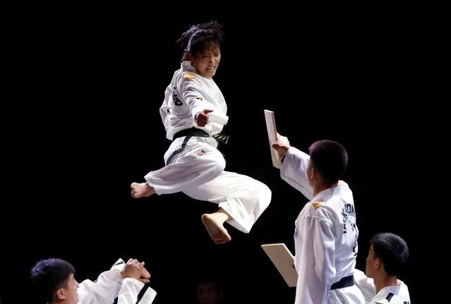 Members of North Korea-led International Taekwondo Federation (ITF) demonstrate their skills at the World Taekwondo Headquarters “Kukkiwon” in Seoul, South Koreaon June 28, 2017. North Korea's International Taekwondo Federation (ITF) delegation is in South Korea for performances at the World Taekwondo Championships. This is the ITF's first visit to South Korea in 10 years. (Photo by Kim Hong-Ji/Reuters)