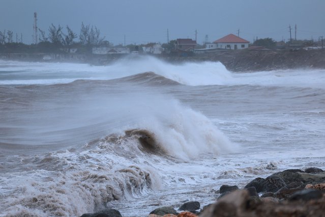 Waves crash ashore as Hurricane Beryl spins offshore on July 03, 2024, in Kingston, Jamaica. Category 4 storm Beryl has caused widespread damage in several island nations as it continues to cross the Caribbean.  (Photo by Joe Raedle/Getty Images)