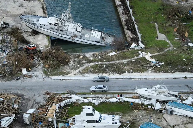 An aerial view of damage from Hurricane Dorian on September 5, 2019, in Marsh Harbour, Great Abaco Island in the Bahamas. Hurricane Dorian lashed the Carolinas with driving rain and fierce winds as it neared the US east coast Thursday after devastating the Bahamas and killing at least 20 people. (Photo by Brendan Smialowski/AFP Photo)