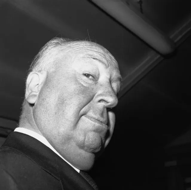 British born Hollywood film director Alfred Hitchcock, master of suspense, provided this study at London airport, United Kingdom on June 8, 1960, as he enplaned for the United States. He has been visiting London at the conclusion of a world tour. (Photo by AP Photo)