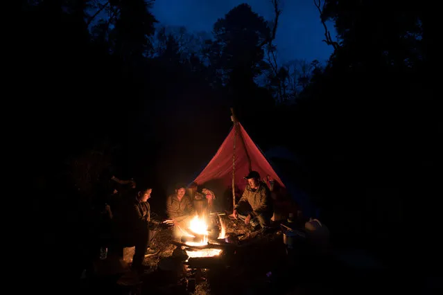 WWF staff and government forest rangers camping in wildlife corridor eight in northern Bhutan. (Photo by Emmanuel Rondeau/WWF UK/The Guardian)
