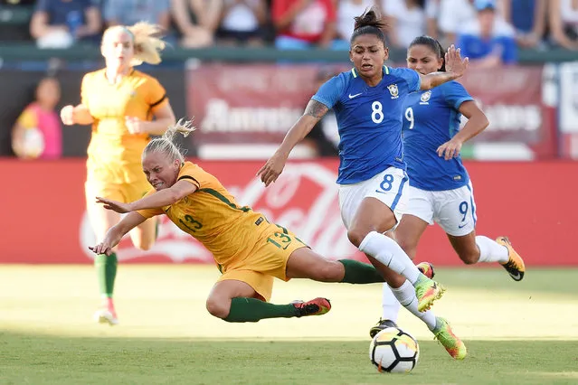 Brazil midfielder Maria (8) pushes down Australia midfielder Tameka Butt (13) while battling for the ball during the second half at StubHub Center on August 3, 2017 in Carson, CA, USA. Australia won 6-1. (Photo by Kelvin Kuo/USA TODAY Sports)