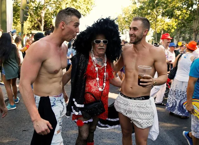 Revellers pose for a picture during a gay pride parade in downtown Madrid, Spain, July 2, 2016. (Photo by Andrea Comas/Reuters)