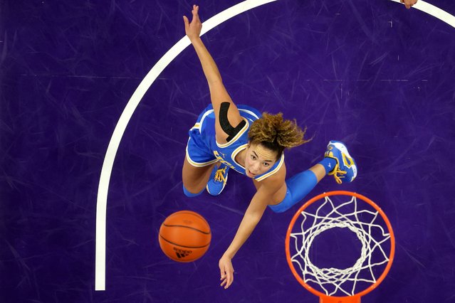 Kiki Rice #1 of the UCLA Bruins watches her shot against the Washington Huskies during the second half at Alaska Airlines Arena on December 08, 2024 in Seattle, Washington. (Photo by Steph Chambers/Getty Images/AFP Photo)