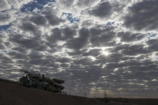 The Soyuz TMA-18M spacecraft is transported to its launch pad at the Baikonur cosmodrome, Kazakhstan, August 31, 2015. (Photo by Shamil Zhumatov/Reuters)