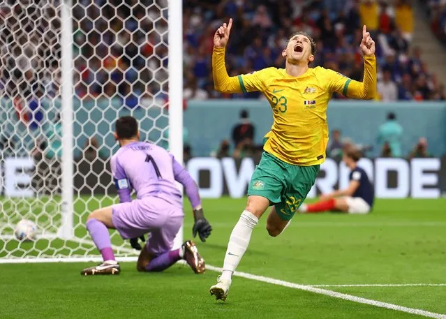 Craig Goodwin of Australia celebrates scoring his side's first goal during the FIFA World Cup Qatar 2022 Group D match between France and Australia at Al Janoub Stadium on November 22, 2022 in Al Wakrah, Qatar. (Photo by Kai Pfaffenbach/Reuters)