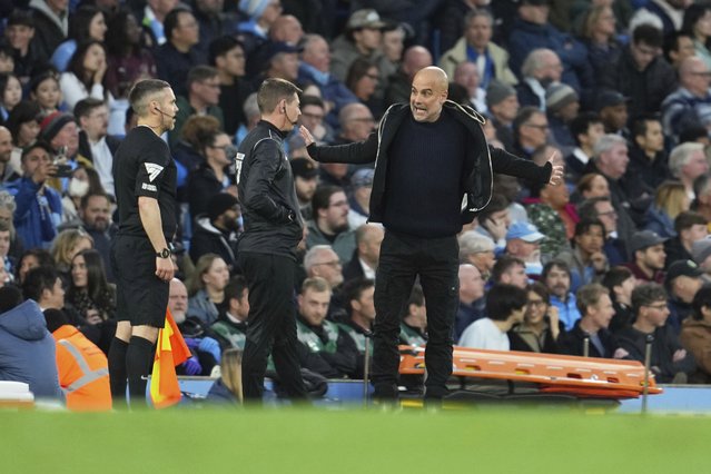 Manchester City's head coach Pep Guardiola, right, reacts during the English Premier League soccer match between Manchester City and Aston Villa at Etihad stadium in Manchester, England, Tuesday, April 22, 2025. (Photo by Jon Super/AP Photo)