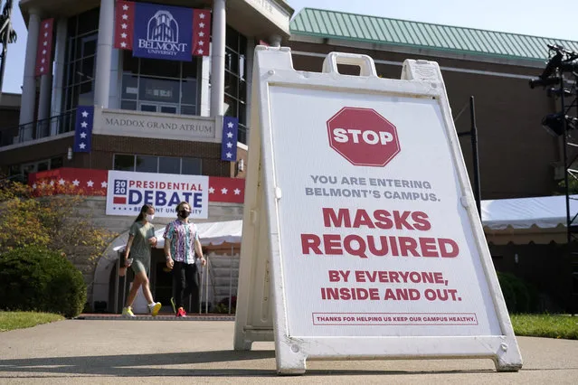 A sign greets visitors outside the Curb Event Center at Belmont University as preparations take place for the second Presidential debate, Tuesday, October 20, 2020, in Nashville, Tenn., during the coronavirus outbreak. Governors of states including Tennessee, Oklahoma, Nebraska and North Dakota are all facing calls from doctors and public health officials to require masks. (Photo by Patrick Semansky/AP Photo)