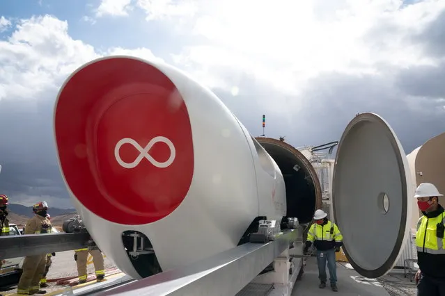 A Virgin Hyperloop pod is seen at their DevLoop test site in Las Vegas, Nevada, in this November 8, 2020 handout image released by Virgin Hyperloop. (Photo by VIRGIN HYPERLOOP/Handout via Reuters)