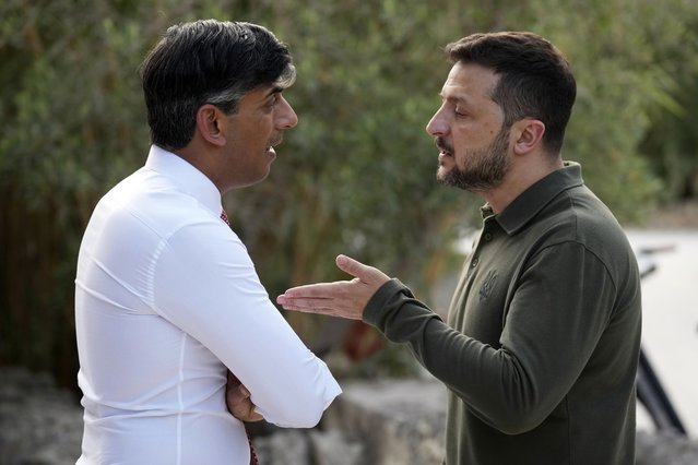 Britain's Prime Minister Rishi Sunak, left, meets with Ukraine President Volodymyr Zelenskyy on the first day of a G7 world leaders summit, at Borgo Egnazia, southern Italy, Thursday, June 13, 2024. (Photo by Christopher Furlong/Pool Photo via AP Photo)
