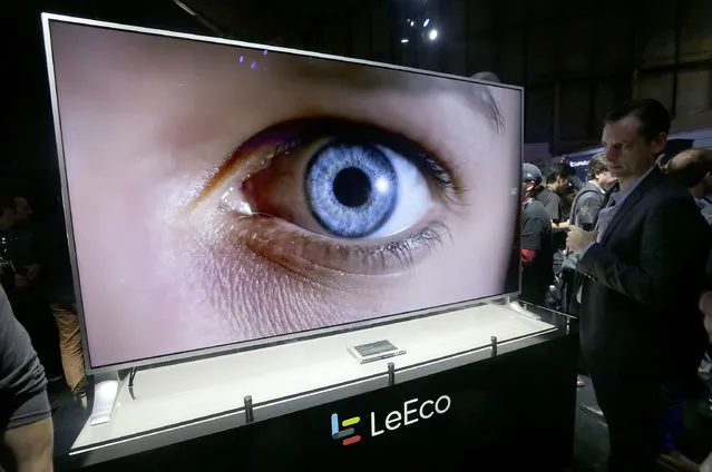 A LeEco uMax 85 television is displayed at an event in San Francisco, Wednesday, October 19, 2016. Most U.S. consumers haven’t heard of LeEco, but the Chinese technology company is setting out to become a household name with a lineup of smartphones and flat-screen TVs undercutting the prices of Apple, Google, Samsung and other industry stalwarts. (Photo by Jeff Chiu/AP Photo)